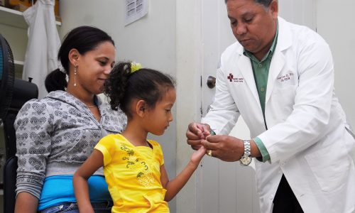 A little girls blood is tested.