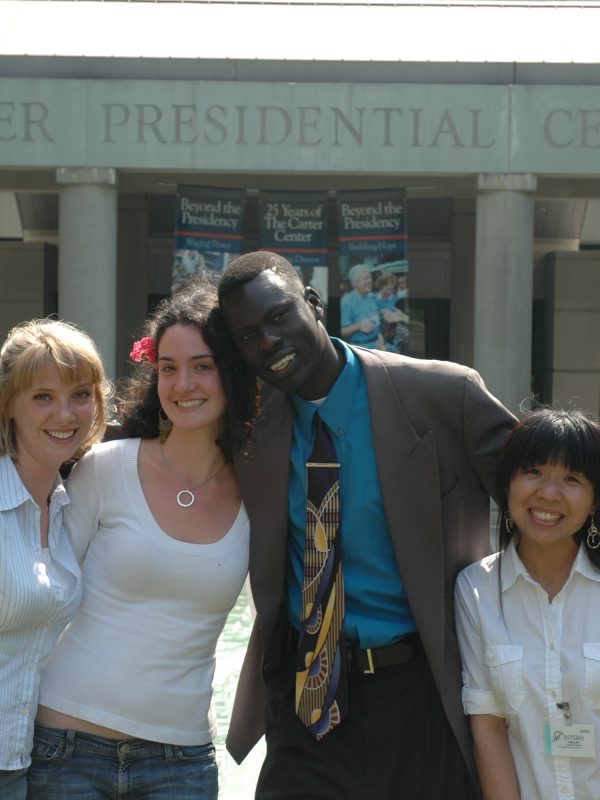 Intern in front of the Jimmy Carter Presidential Library and Museum.