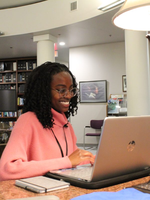 Intern on her laptop at The Carter Center.