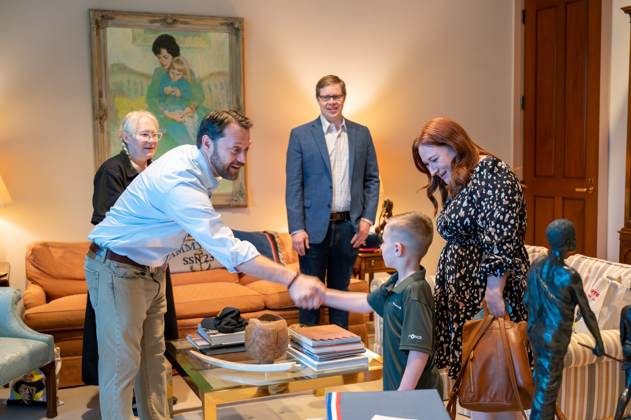 Ryan Ramos and Jason Carter shake hands